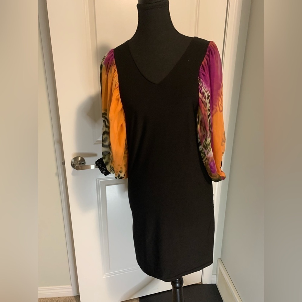 BCBG Maxazria ladies dress in size L BUT fits like a size small